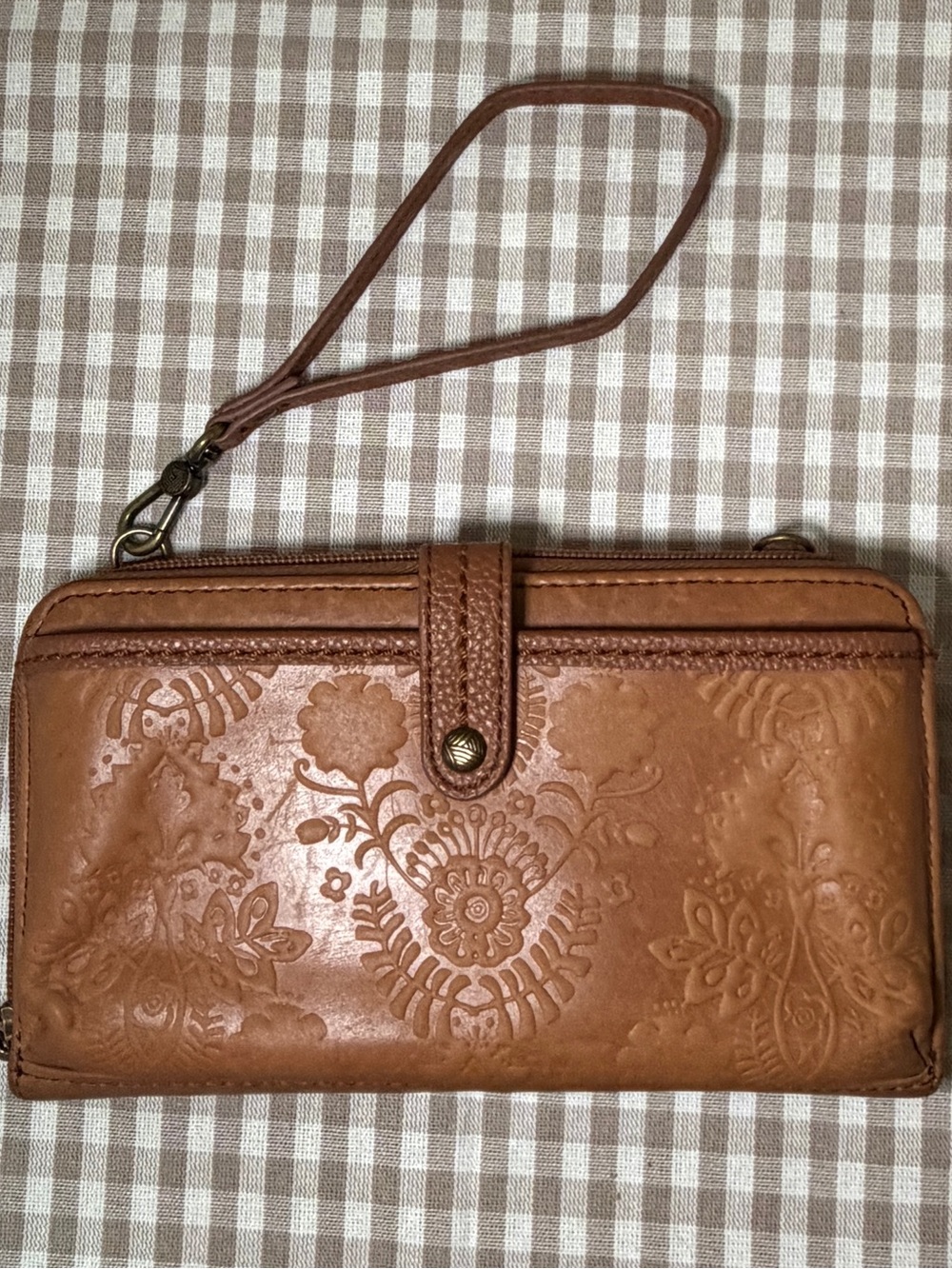 The Sak Brown Leather Wallet Smartphone Wristlet Floral Embossed